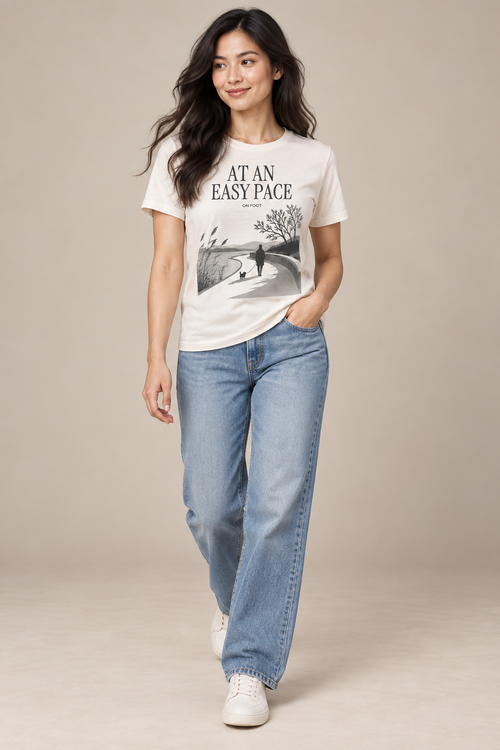 At An Easy Pace — Female model wearing a light T-shirt with the front artwork. Daily Elsewhere.