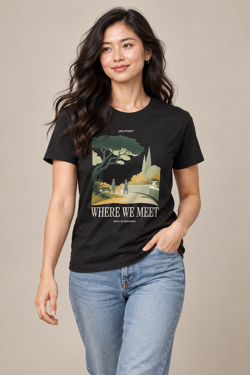 Where We Meet — Female model wearing a dark T-shirt with light front artwork. Daily Elsewhere.