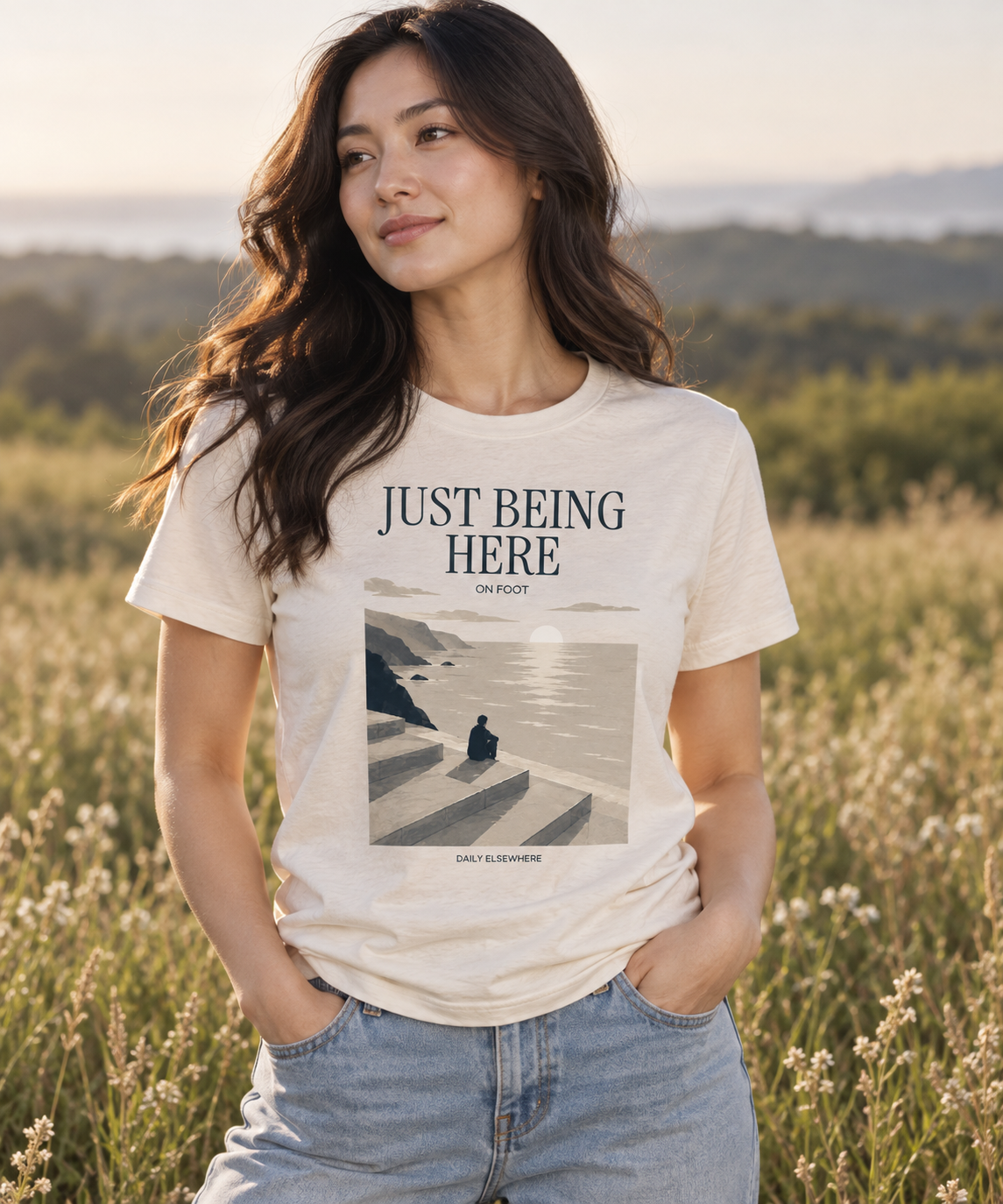 Just Being Here — Male model wearing a light T-shirt with the front artwork. Daily Elsewhere.