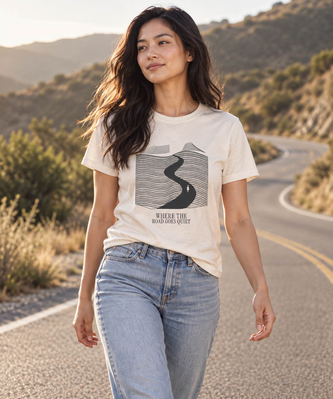 Where the Road Goes Quiet — Male model wearing a light T-shirt with the front artwork. Daily Elsewhere.
