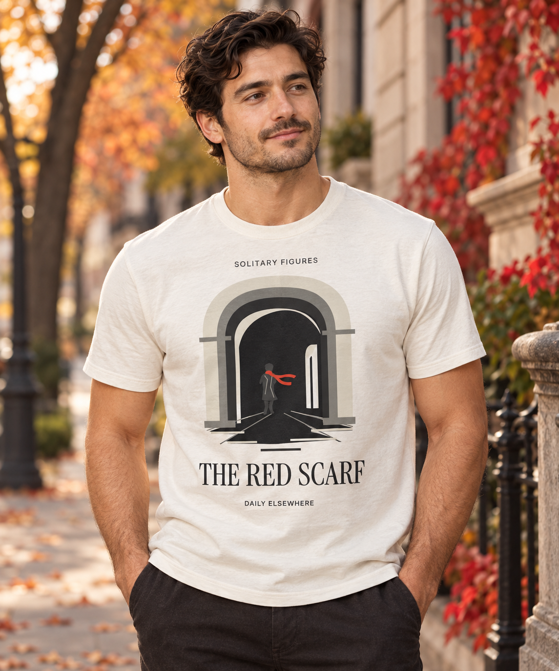 The Red Scarf — Male model wearing a light T-shirt with the front artwork. Daily Elsewhere.
