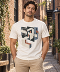 Woven District — Male model wearing a light T-shirt with the front artwork. Daily Elsewhere.