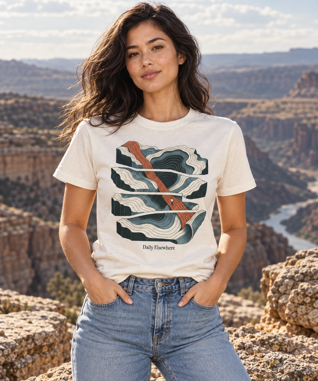 Fault Line — Female model wearing a light T-shirt with the front artwork. Daily Elsewhere.