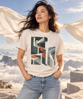 Different Gravity — Male model wearing a light T-shirt with the front artwork. Daily Elsewhere.