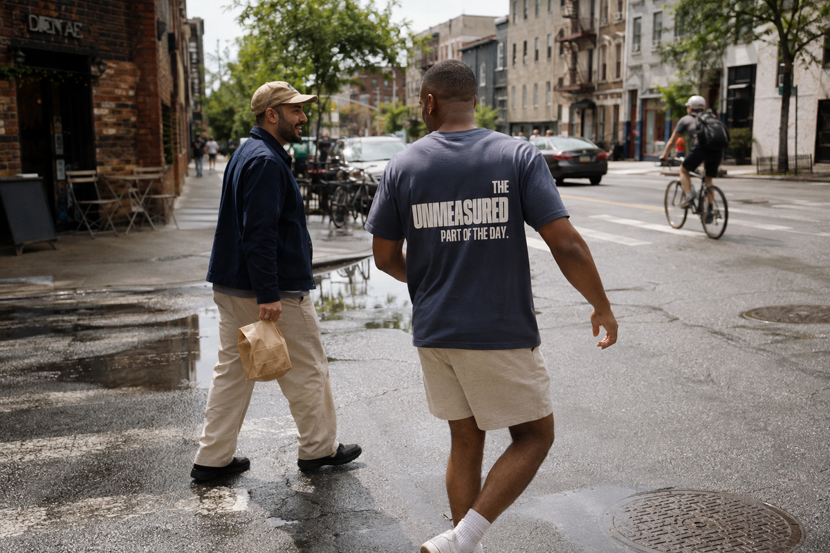 The Unmeasured Part of the Day in Navy, worn while crossing a neighbourhood street with a friend.